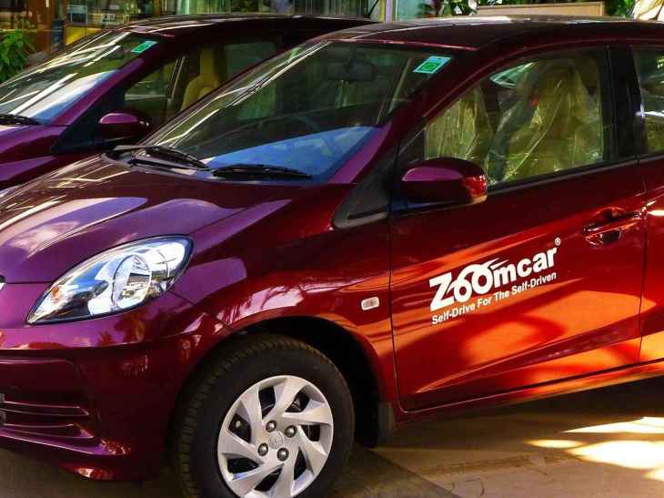 Indian Red Car Logo - India's Zoomcar raises $40M led by automotive giant Mahindra ...