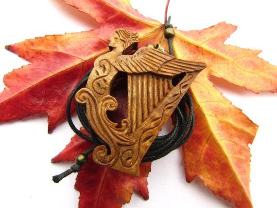 Winged Harp Logo - WINGED HARP music jewelry Pendant hand carved on walnut wood