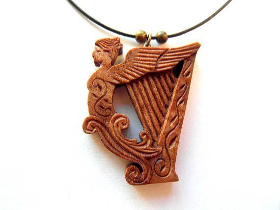 Winged Harp Logo - WINGED HARP Pendant / handcarved on walnut wood. Harp ❤ Jewelery