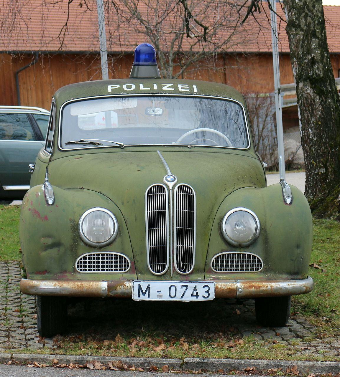 Old German Car Logo - Old German police car. Photo by Antranias, public domain. B M W