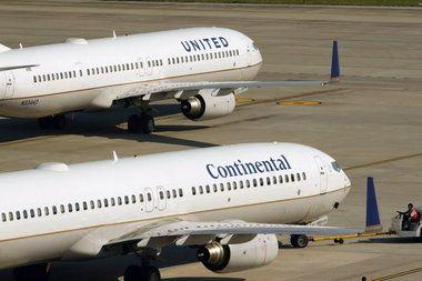 Continental Airlines Globe Logo - United Airlines reports strong third-quarter profits | cleveland.com