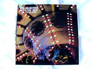 Flying Bird with Yellow Circle Logo - Vinyl 7: Noel Gallagher's High Flying Birds : Lock All The Doors