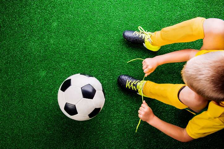 Shoe Kicking Soccer Ball Logo - Choosing the Right Soccer Shoe - Apex Indoor Sports