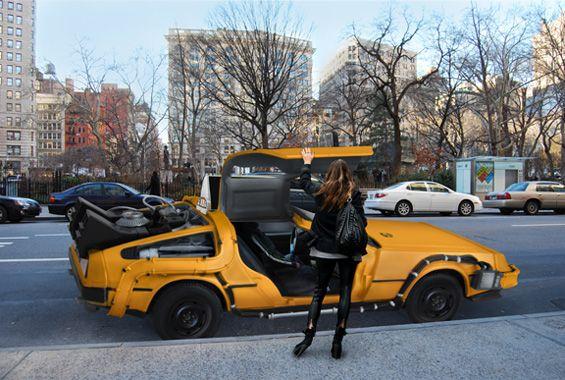 DeLorean Car Logo - NYC Yellow Taxi with a Difference - [otsoNY.com]