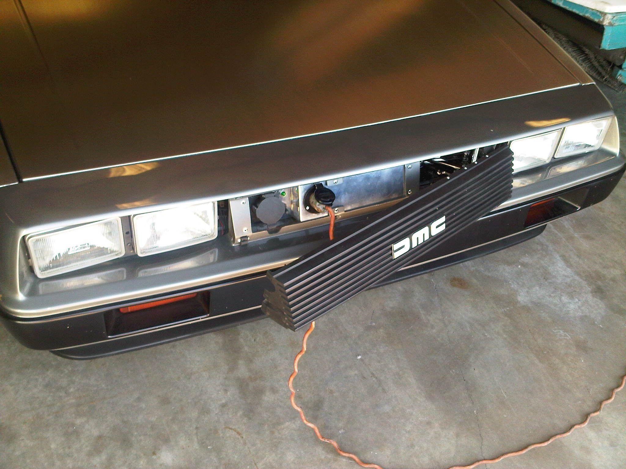 DeLorean Grill Logo - electric plug behind the grill DMCev is the model | DeLorean ...