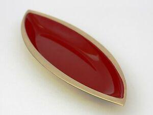 Glossy Red Oval Logo - Gunnar Ander, Ystad Metall dish in brass and glossy red