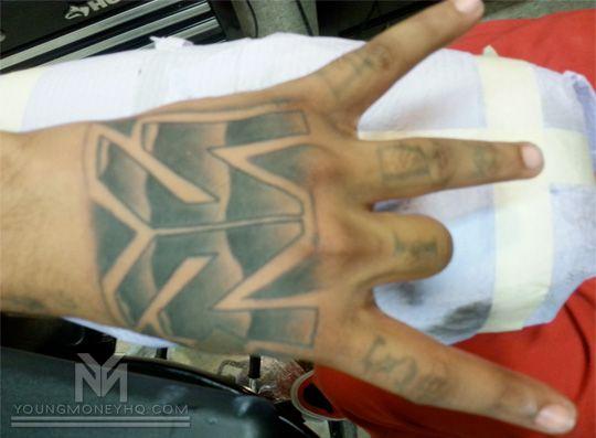 Young Money Logo - Flow Gets The Young Money Logo Tattooed On His Hand | Young Money HQ