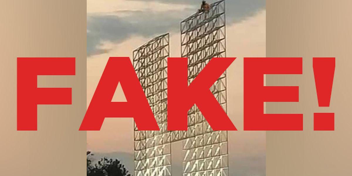 The Ball and the Big H Logo - Image showing man atop 'Big H' sign is fake, police say