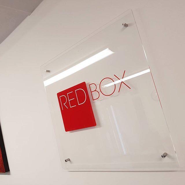 Red Box Company Logo - Why don't we put a massive Red Box logo on the wall..?