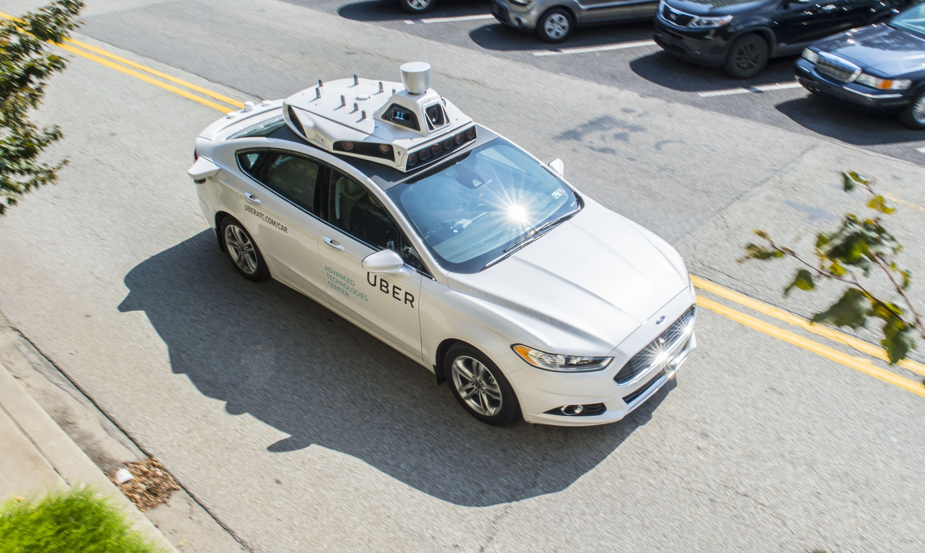 Actual Size Uber Driving Logo - As Uber's robot cars hit the streets in Pittsburgh, the fears of its ...