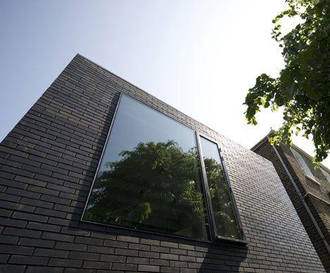 Gold and Black House Logo - The Shadow House by Liddicoat & Goldhill | Dezeen