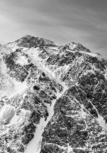Black and White Mountain Peak Logo - Mountain peak against the sky. Black and white the snow-capped ...