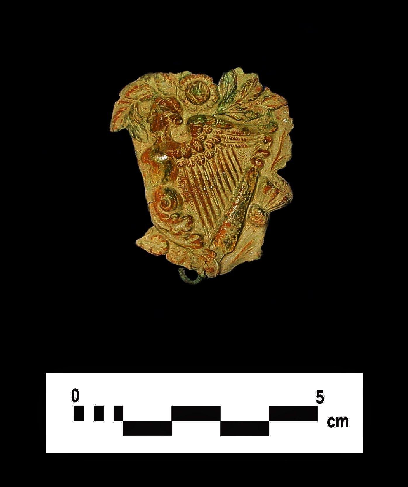 Lady as Harp Logo - Irish Lady Harp brooch discovered during excavations