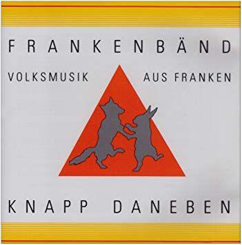 Red in Red Triangle Kangaroo Logo - Knapp Daneben - Amazon.com Music