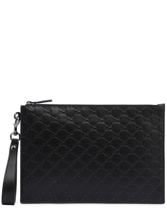 Gucci Supreme Logo - GUCCI, Signature gg supreme logo leather pouch, Black, Luisaviaroma