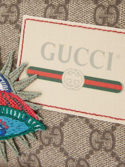 Gucci Supreme Logo - GG Supreme logo and spaceship-patch wallet | Gucci | MATCHESFASHION ...