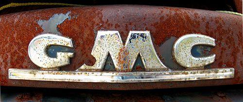 Old GMC Logo - Old GMC Logo. Old GMC logo on a rusted out hulk of a truck