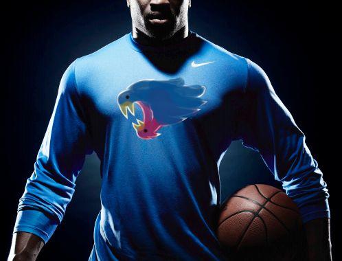 Bird Choking Cardinal Basketball Logo - University of Kentucky's new wildcats logo looks like two birds ...
