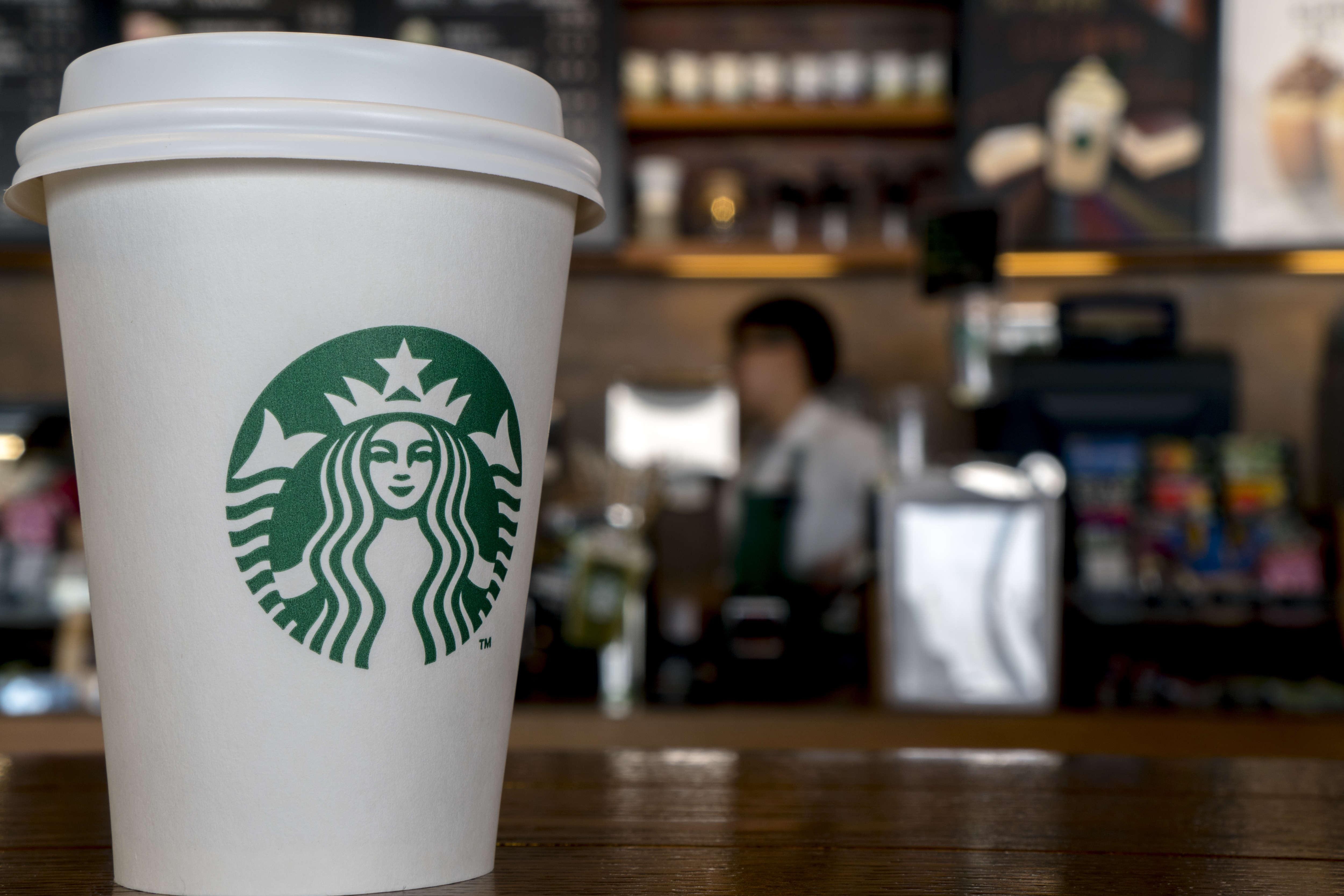 Large Starbucks Logo - A Lesson in Logo Design from Starbucks' Iconic Siren