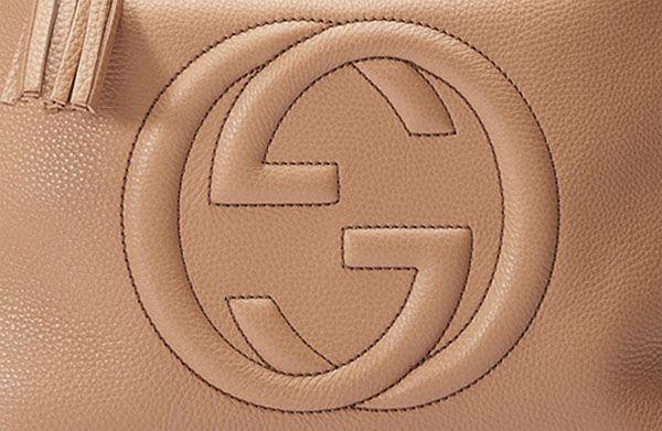 Double G Logo - Gucci History: Gucci Signature Double G