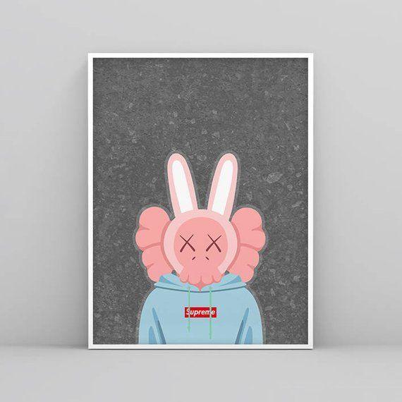 Kaws Print Logo - Pink Accomplice wearing Supreme hoodie, Kaws Print, Kaws Poster ...