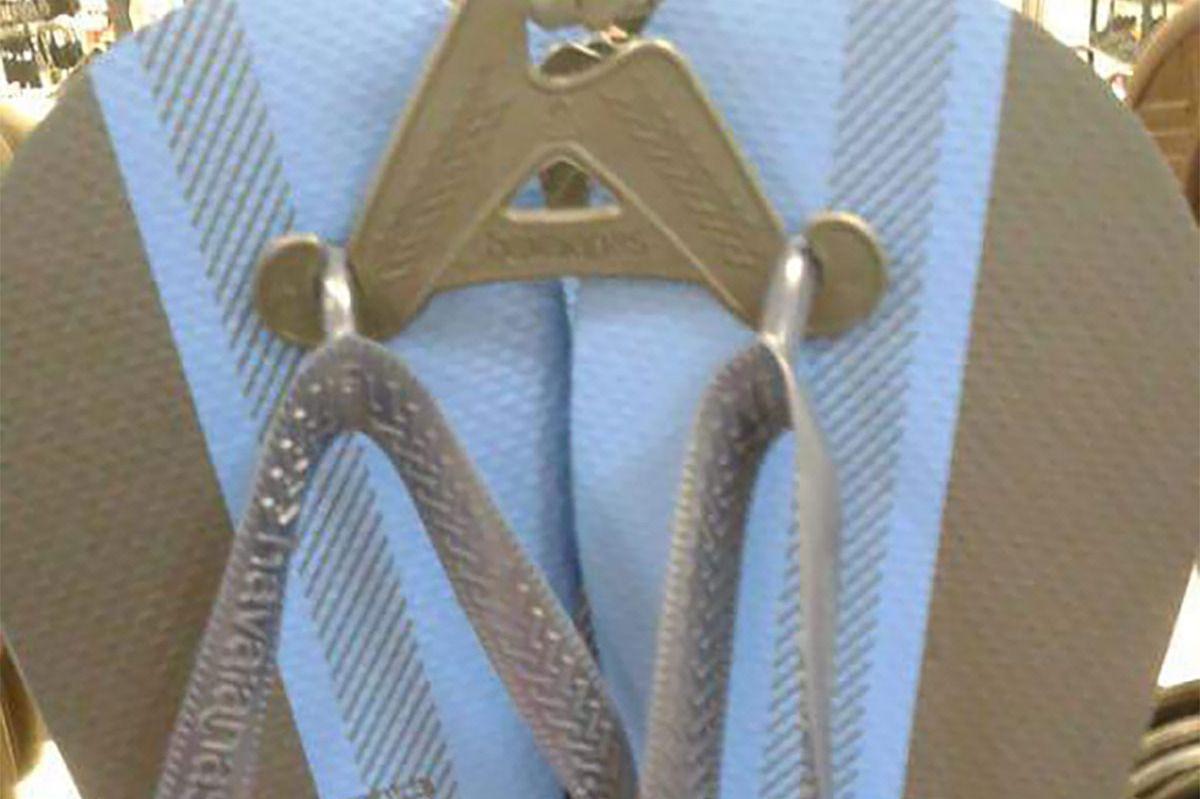 White and Blue Ir Logo - Gold-White, Black-Blue Flip-Flops Are the New Dress