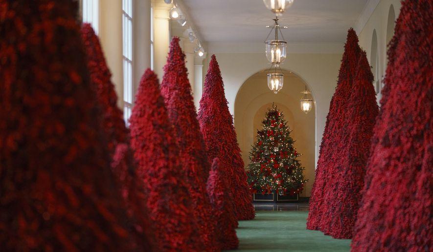 Red and White Tree Logo - Melania Trump 'blood-red' White House Christmas trees torched by ...