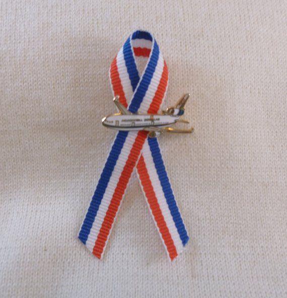 Red and Blue Ribbon Airline Logo - Small McDonnell Douglas Plane on Red White and Blue Ribbon