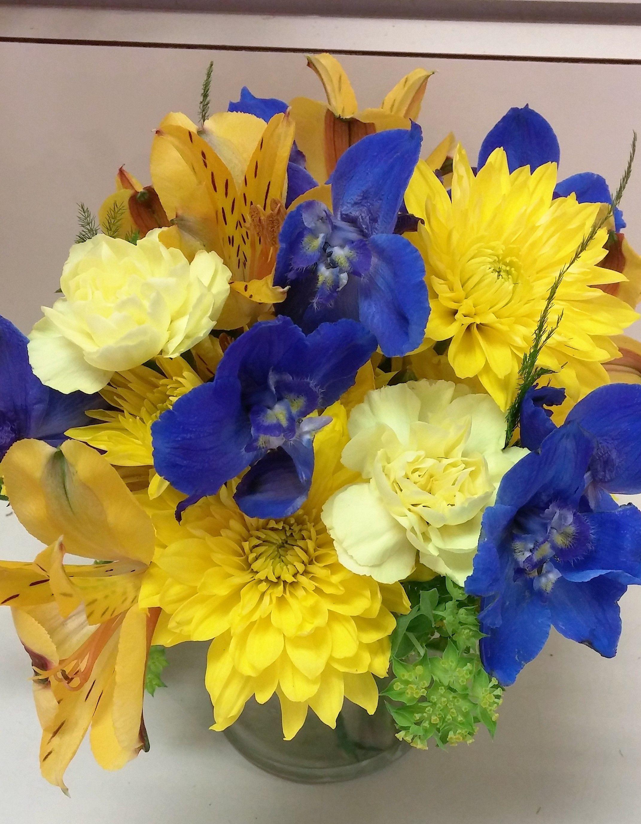Floral Blue U Logo - u of m flower arrangement. maize and blue flowers. blue delphinium