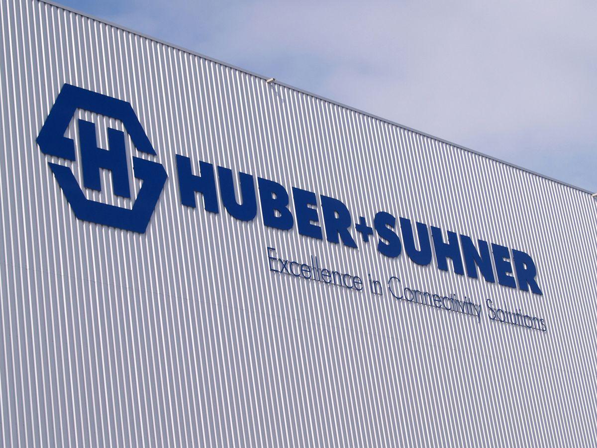 Huber Logo - Huber Suhner communicates about connectivity