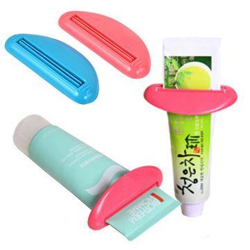 Squeezer Logo - China Promotional plastic toothpaste holder squeezer custom your