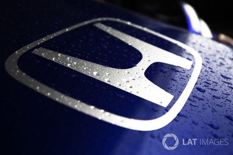 Blue Honda Logo - Rain drops on a Honda logo on the nose of the Toro Rosso STR13 Honda ...