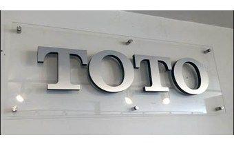 Toto Logo - toto-logo-silhouette-on-acrylic-main - Designers Circle HQ