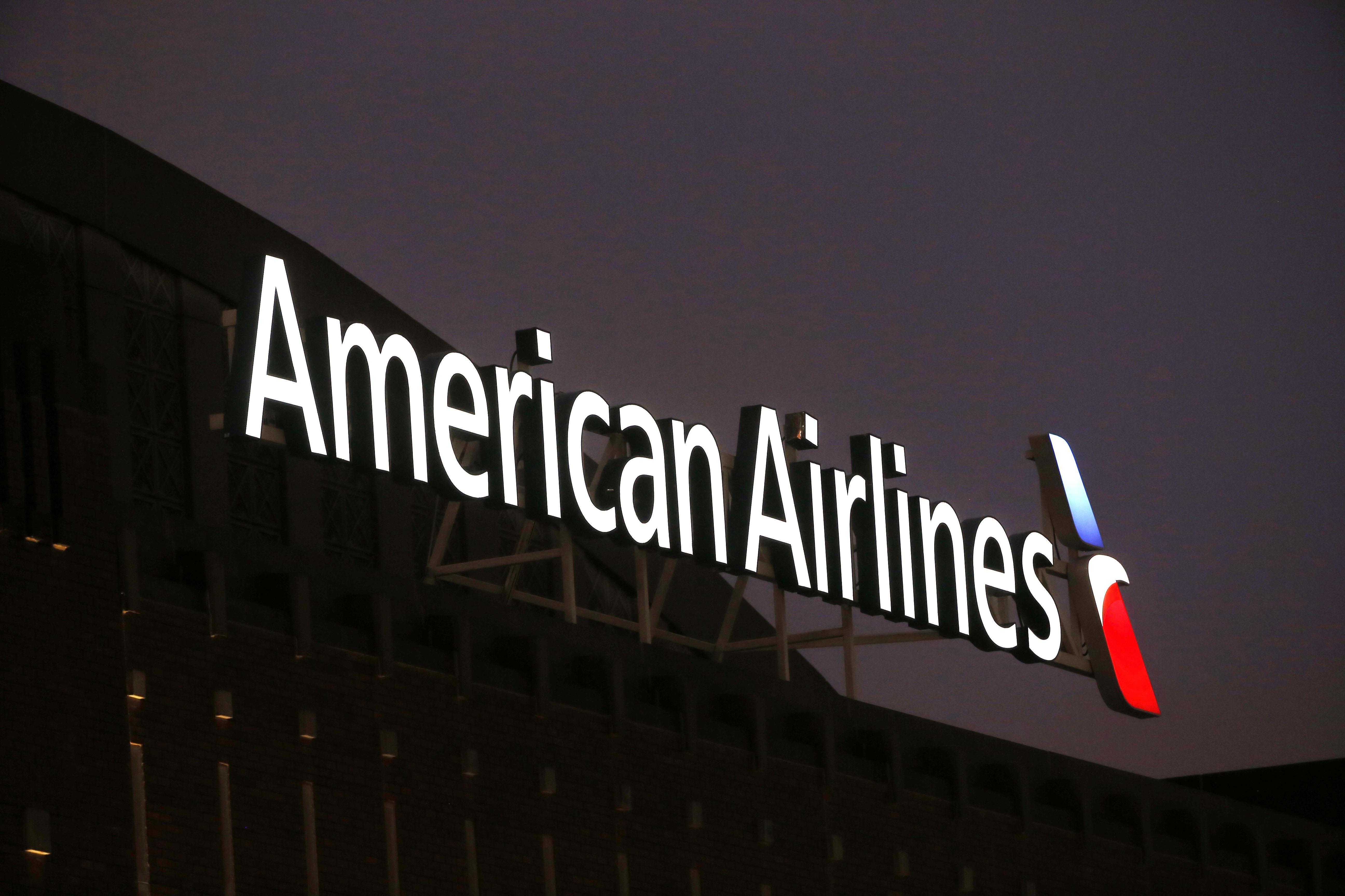 4Q Logo - American Airlines Sees Profits Fall In 4Q. The Spokesman Review