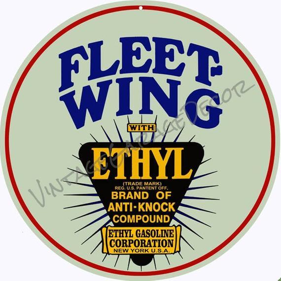 Fleetwing Logo - Reproduction Fleet Wing with Ethyl Logo Round Metal Sign | Etsy