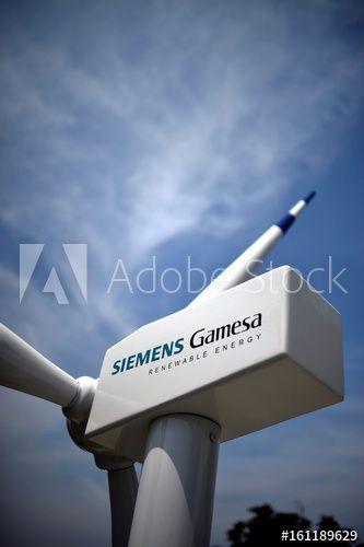 Gamesa Logo - A model of a wind turbine with the Siemens Gamesa logo is displayed