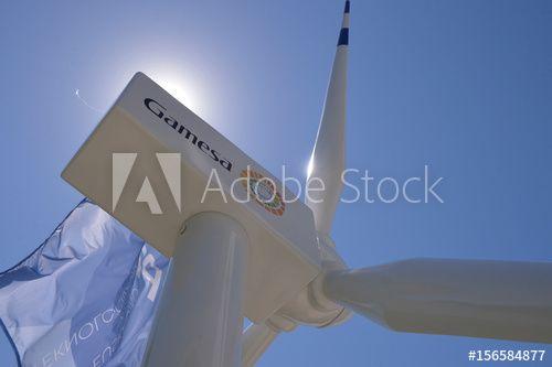 Gamesa Logo - A model of a turbine with the Gamesa logo on it stands near the ...