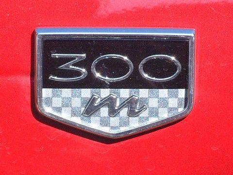 300M Logo - 2001 Chrysler 300M Inferno Red Logo sv F - Picture Gallery - Motorbase