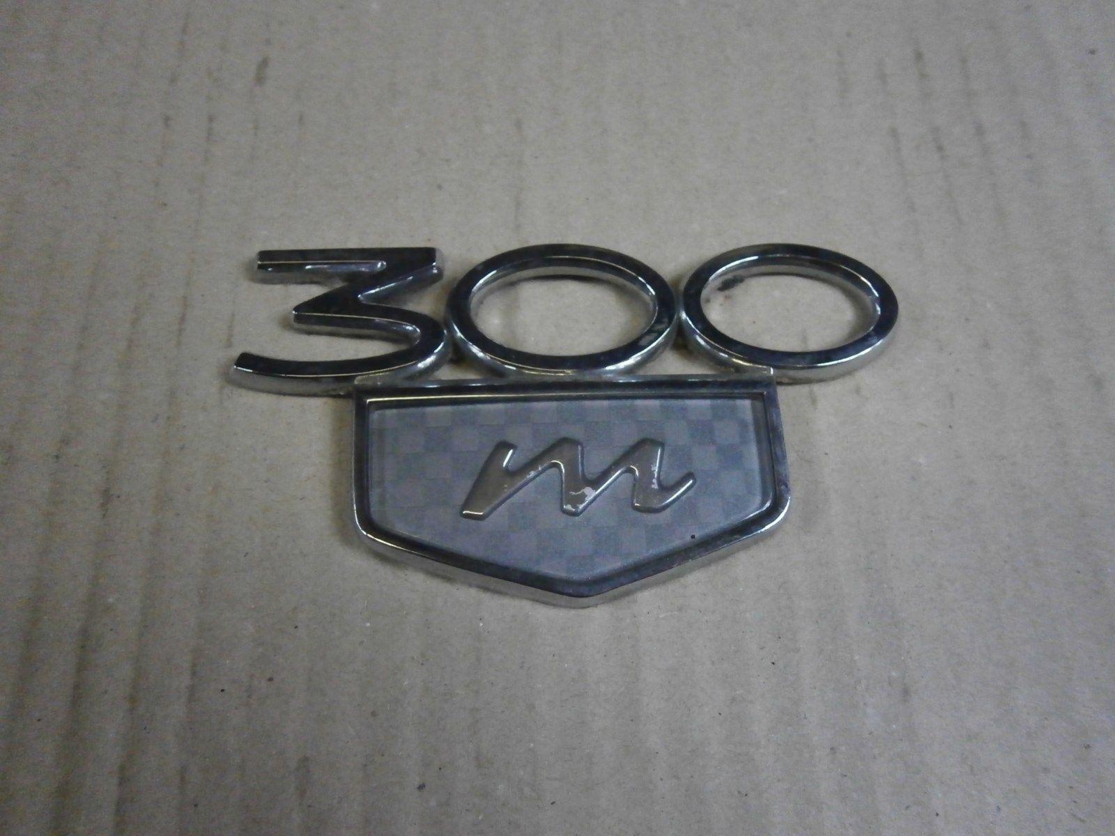 300M Logo - EMBLEMAT LOGO ORYGINAŁ CHRYSLER 300M - 7270471945 - oficjalne ...