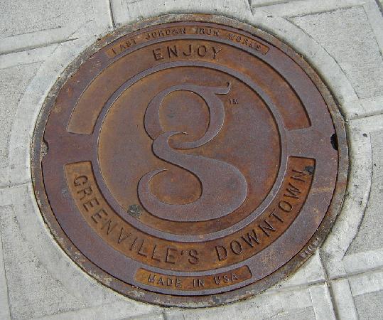 Manhole Logo - manhole cover of Greenville, South Carolina