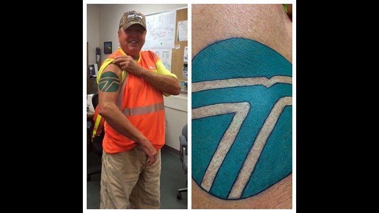 WSDOT Logo - Veteran WSDOT employee tattoos logo on his arm