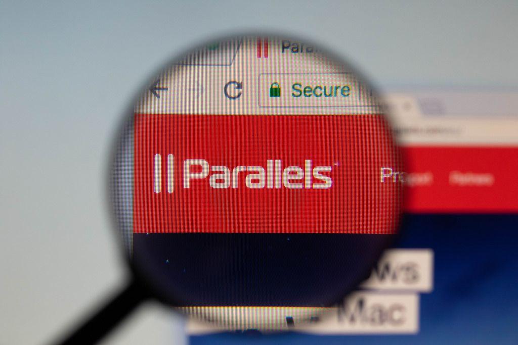 Parallels Logo - Parallels logo on a computer screen with a magnifying glas