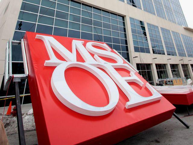 MSOE Logo - OnMilwaukee.com Gallery: MSOE signs lifted onto Grohmann Tower