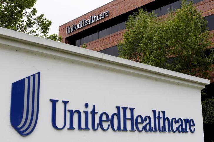 DJIA Logo - UnitedHealth earnings ease investor worries over flu season, stock up