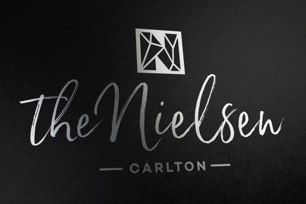 Nielsen Logo - The Nielsen Apartments - Logo Design - Black Moon Alchemy