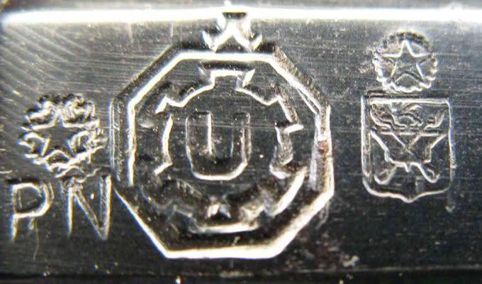 Uberti Logo - Uberti Factory Stamp surrounded by an Octagon Firing