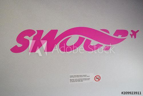 Swoop Logo - The Swoop logo is pictured during a presentation by WestJet ...