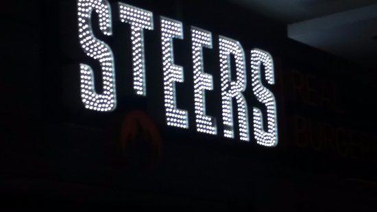 Steers Logo - Logo above door of Steers, Flic En Flac