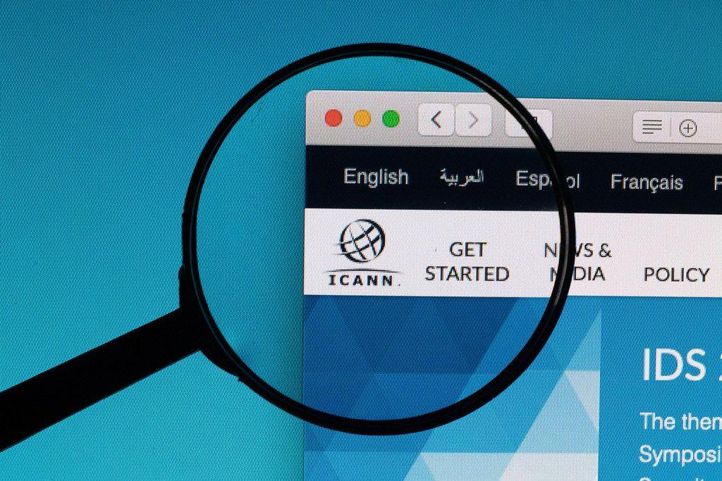 ICANN Logo - ICANN logo under magnifying glass. ✅ Marco Verch is a Profe