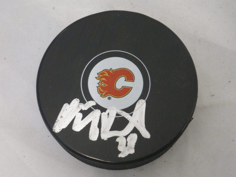 Backstrom Logo - Nicklas Bäckström Calgary Flames Signed Logo Puck